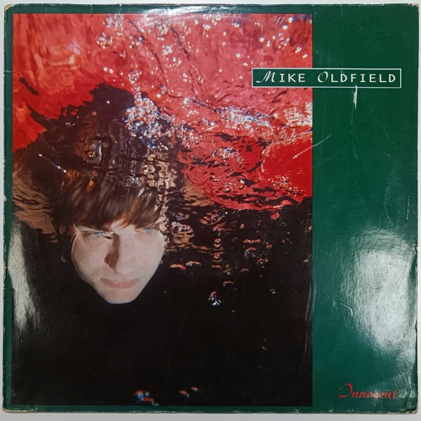 Mike Oldfield - Innocent (cover is damaged by water) - LP (Used Vinyl)
